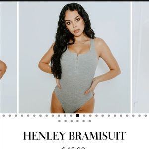 Klassy network grey henley bodysuit sz M